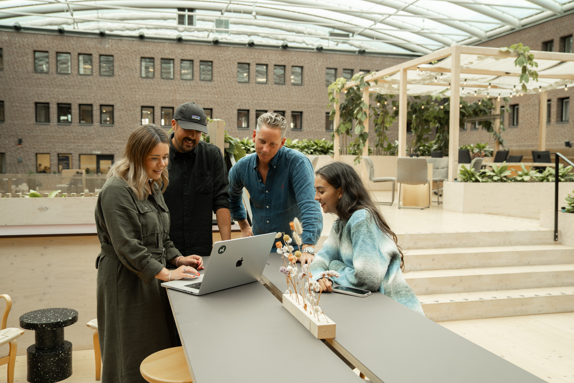 Personer på en digital byrå